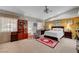 Large main bedroom offers generous space, a walk-in closet, and warm, inviting decor with natural light at 8365 Haven St, Las Vegas, NV 89123