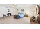 This comfortable bedroom features wall to wall carpeting and light walls at 879 Judi Pl, Boulder City, NV 89005