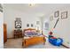 This nice bedroom features wall to wall carpeting, light walls, a window and closet at 879 Judi Pl, Boulder City, NV 89005