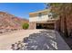 This property includes a spacious two-car garage and built-in cabinets, offering ample storage at 879 Judi Pl, Boulder City, NV 89005