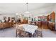 Spacious open-concept kitchen and dining area with hardwood floors and plenty of storage at 879 Judi Pl, Boulder City, NV 89005