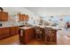 Bright kitchen with light-filled windows, a breakfast bar, and views of the surrounding area at 879 Judi Pl, Boulder City, NV 89005