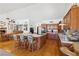 Open kitchen with a breakfast bar, hardwood floors, and ample cabinet space at 879 Judi Pl, Boulder City, NV 89005