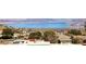 Gorgeous lake view from the home's rooftop, surrounded by lush greenery at 879 Judi Pl, Boulder City, NV 89005