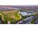 Aerial shot of a community with a large park, sports fields, playground, and community center at 8944 Skye Canyon Ranch St, Las Vegas, NV 89166