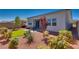Backyard features desert landscaping, covered patio, and privacy at 8944 Skye Canyon Ranch St, Las Vegas, NV 89166