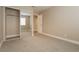 Bedroom features carpet, mirrored closet, and a door leading to another room at 9004 Crystal Glass Dr, Las Vegas, NV 89117