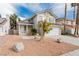 Charming two-story home with a well-maintained lawn, two-car garage, and desert landscaping at 9004 Crystal Glass Dr, Las Vegas, NV 89117