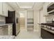 This kitchen features granite countertops, stainless steel appliances and a walk-in pantry at 9004 Crystal Glass Dr, Las Vegas, NV 89117