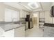Updated kitchen boasts granite counters and stainless steel appliances at 9004 Crystal Glass Dr, Las Vegas, NV 89117