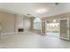 Bright living room features a fireplace and French doors to the backyard at 9004 Crystal Glass Dr, Las Vegas, NV 89117