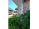 Charming home exterior with lush greenery and a covered entrance to the home at , Las Vegas, NV 89122