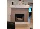 Elegant fireplace features stone and an elevated hearth for added warmth at , Las Vegas, NV 89122