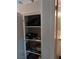 Neat linen closet with shelving for organizing linens, shoes, and games at , Las Vegas, NV 89122