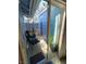 This exterior patio with sliding glass doors offers relaxing outdoor space, featuring string lights and a charming exterior storage closet at , Las Vegas, NV 89122
