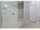 Modern bathroom featuring a tiled shower, a sleek design, and modern fixtures at 10158 Super Jovian St, Las Vegas, NV 89143