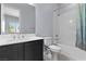 Bathroom with modern fixtures, a single vanity with storage, and a shower-tub combination at 10158 Super Jovian St, Las Vegas, NV 89143