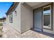 Charming exterior featuring a covered entrance, stone accents, and a well-manicured walkway at 10158 Super Jovian St, Las Vegas, NV 89143