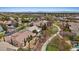 Community aerial view with lush landscaping, walking paths, and easy access to neighborhood amenities at 10563 Sunblower Ave, Las Vegas, NV 89135