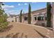 Beautiful single-story home with a rock yard and lovely trees at 10563 Sunblower Ave, Las Vegas, NV 89135