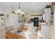 Bright kitchen with white cabinetry, a center island, and modern appliances, perfect for cooking and entertaining at 10563 Sunblower Ave, Las Vegas, NV 89135