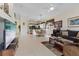 Open floor plan combining the living room and kitchen, perfect for entertaining and everyday living at 10563 Sunblower Ave, Las Vegas, NV 89135