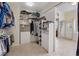 Spacious walk-in closet offering multiple shelves and hanging storage solutions at 10563 Sunblower Ave, Las Vegas, NV 89135