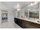 Spacious bathroom showcasing double sinks, modern fixtures, and walk-in shower at 134 Lomita Heights Dr, Las Vegas, NV 89138