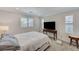 Cozy bedroom with neutral colors, window shutters, and comfortable bedding at 134 Lomita Heights Dr, Las Vegas, NV 89138