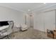 Office or Bedroom with comfortable chair, natural light, and built-in closet at 134 Lomita Heights Dr, Las Vegas, NV 89138