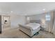 Bright bedroom with large bed, neutral color scheme, and a calm, inviting atmosphere at 134 Lomita Heights Dr, Las Vegas, NV 89138