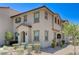 Stylish two-story home with a tiled roof and meticulously landscaped surroundings at 134 Lomita Heights Dr, Las Vegas, NV 89138