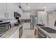 Updated kitchen featuring stainless steel appliances, granite countertops, and ample counter space at 134 Lomita Heights Dr, Las Vegas, NV 89138