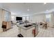 Open-concept living space featuring a large island with seating, bright interiors, and lots of natural light at 134 Lomita Heights Dr, Las Vegas, NV 89138