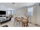 Open floor plan with a dining area, leading into a well-lit living space at 134 Lomita Heights Dr, Las Vegas, NV 89138