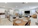Open floor plan seamlessly connects the kitchen, dining area, and living room, perfect for entertaining at 134 Lomita Heights Dr, Las Vegas, NV 89138