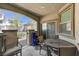 Cozy outdoor patio with seating area perfect for relaxing and enjoying the neighborhood views at 134 Lomita Heights Dr, Las Vegas, NV 89138