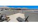 Enjoy mountain views from this rooftop deck featuring lounge chairs and an outdoor firepit at 134 Lomita Heights Dr, Las Vegas, NV 89138