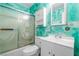 Bright bathroom features a shower, vanity, and mirrored medicine cabinet for a functional and clean space at 1805 Helen Ave, North Las Vegas, NV 89032