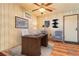 Functional home office features a classic desk, comfortable chairs, and ample lighting, creating an ideal workspace at 1805 Helen Ave, North Las Vegas, NV 89032
