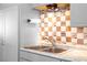 Close up on stainless steel double sink, faucet, and counter top at 1805 Helen Ave, North Las Vegas, NV 89032