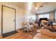 Cozy living area showcases natural light, wood paneling, and comfortable seating, perfect for a relaxed atmosphere at 1805 Helen Ave, North Las Vegas, NV 89032