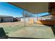 Covered patio with chainlink fence in background at 1805 Helen Ave, North Las Vegas, NV 89032