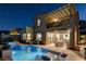 Backyard pool and spa with covered patio and lounge area, great for outdoor entertaining at 1968 Regal Bluff Dr, Henderson, NV 89052