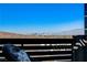 This balcony has mountain views and comfortable wicker seating at 1968 Regal Bluff Dr, Henderson, NV 89052