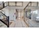 Spacious foyer showcases light wood floors, modern design, and access to patio at 1968 Regal Bluff Dr, Henderson, NV 89052