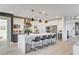 Modern kitchen with large island, stainless steel appliances, and sleek design at 1968 Regal Bluff Dr, Henderson, NV 89052
