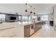 Bright, modern kitchen features large island, stainless steel appliances, and open floor plan at 1968 Regal Bluff Dr, Henderson, NV 89052
