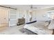 The spacious bedroom includes an ensuite bathroom, walk-in closet, and a ceiling fan at 1968 Regal Bluff Dr, Henderson, NV 89052