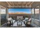Cozy covered patio with elegant furniture, offering a tranquil retreat with neighborhood views at 1968 Regal Bluff Dr, Henderson, NV 89052